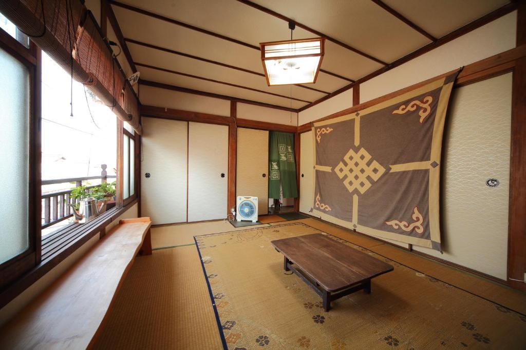 Buddha Guest House Tanabe Værelse billede